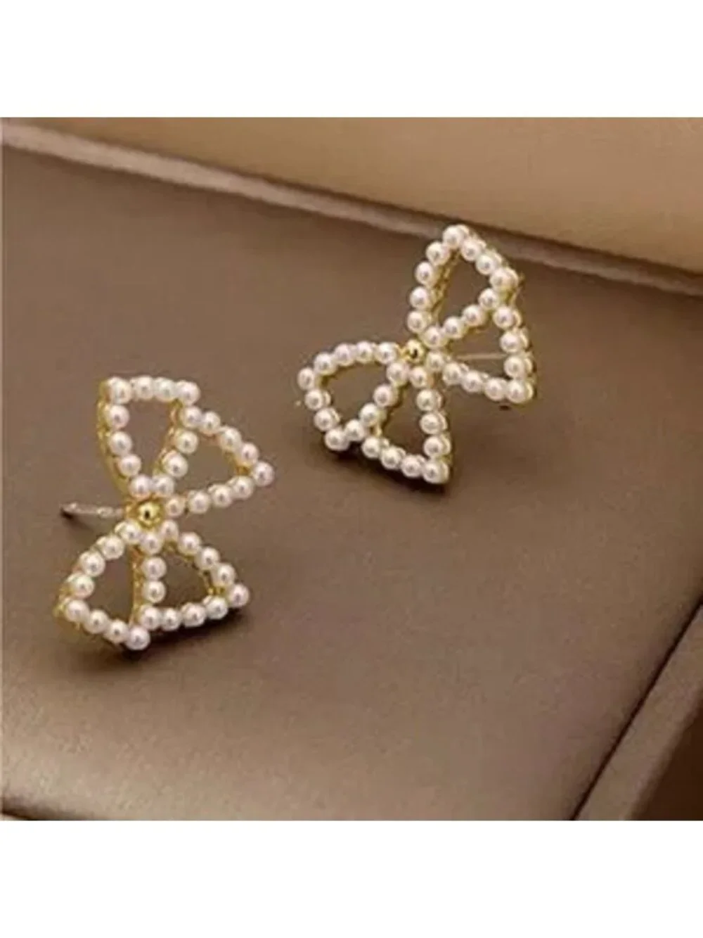 Gold Pearl Bow Tie Earrings